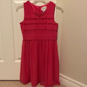 Pink sleeveless children’s dress. 14